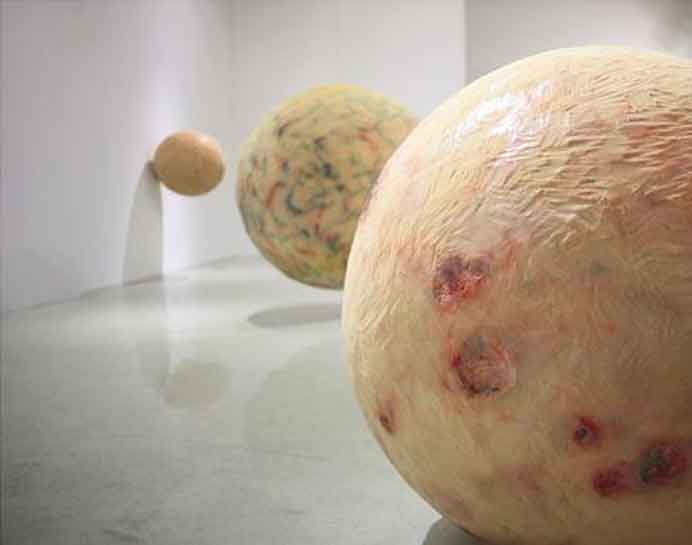   Gao Shan  高珊  -  portrait  -  Sphere shape in space  -  2010-2012  -  sponge, mineral pigment, silicone, human hair  -  variable size 
