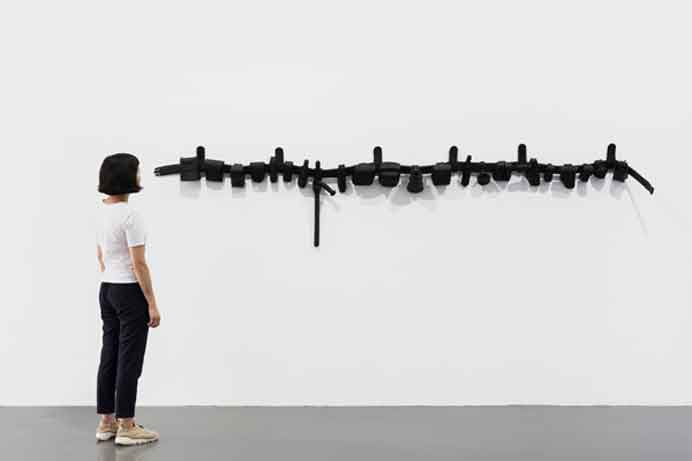 Liu Xinyi  刘辛夷  -  Overweight Constable  -  polymer clay, spray paint, velcro buckle  -  60 x 330 x 13 cm  -  2019