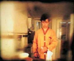 � Adagp Pierrick Sorin - L'homme qui aimait les biscottes 1988 Film super 8 transf�r�  - Collection du Frac Pays de la Loire